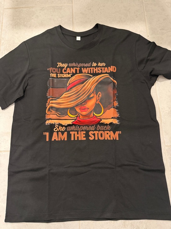 Tops - NWOT Black Graphic Design Printed Shirt “I am the Storm”